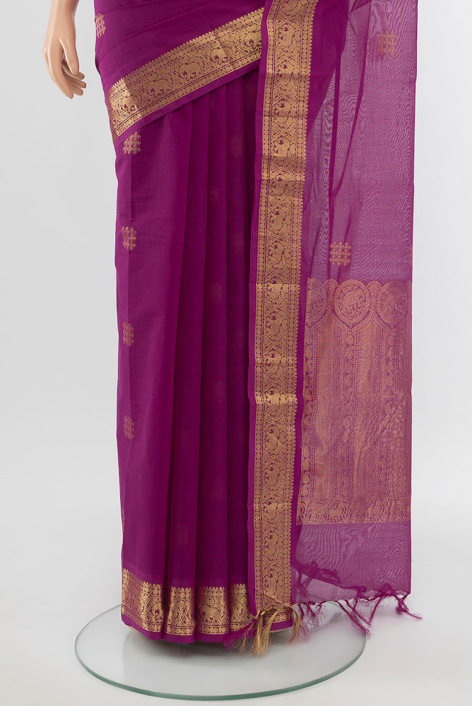 Pleats and pallu of Purple Kora Cotton Saree with Zari Butta on the body and Silk Border. 