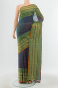 Peacock Blue Kora Cotton Saree with Zari Butta on the body and Silk Border.  displayed on a mannequin