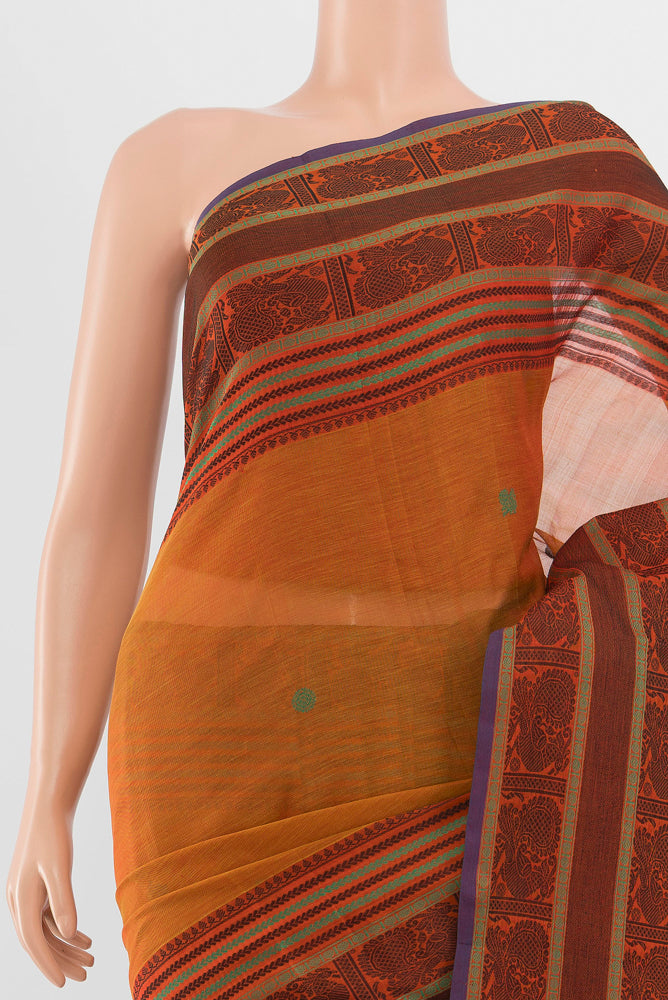 Border image of Mustard Kora Cotton Saree with Zari Butta on the body and Silk Border. 