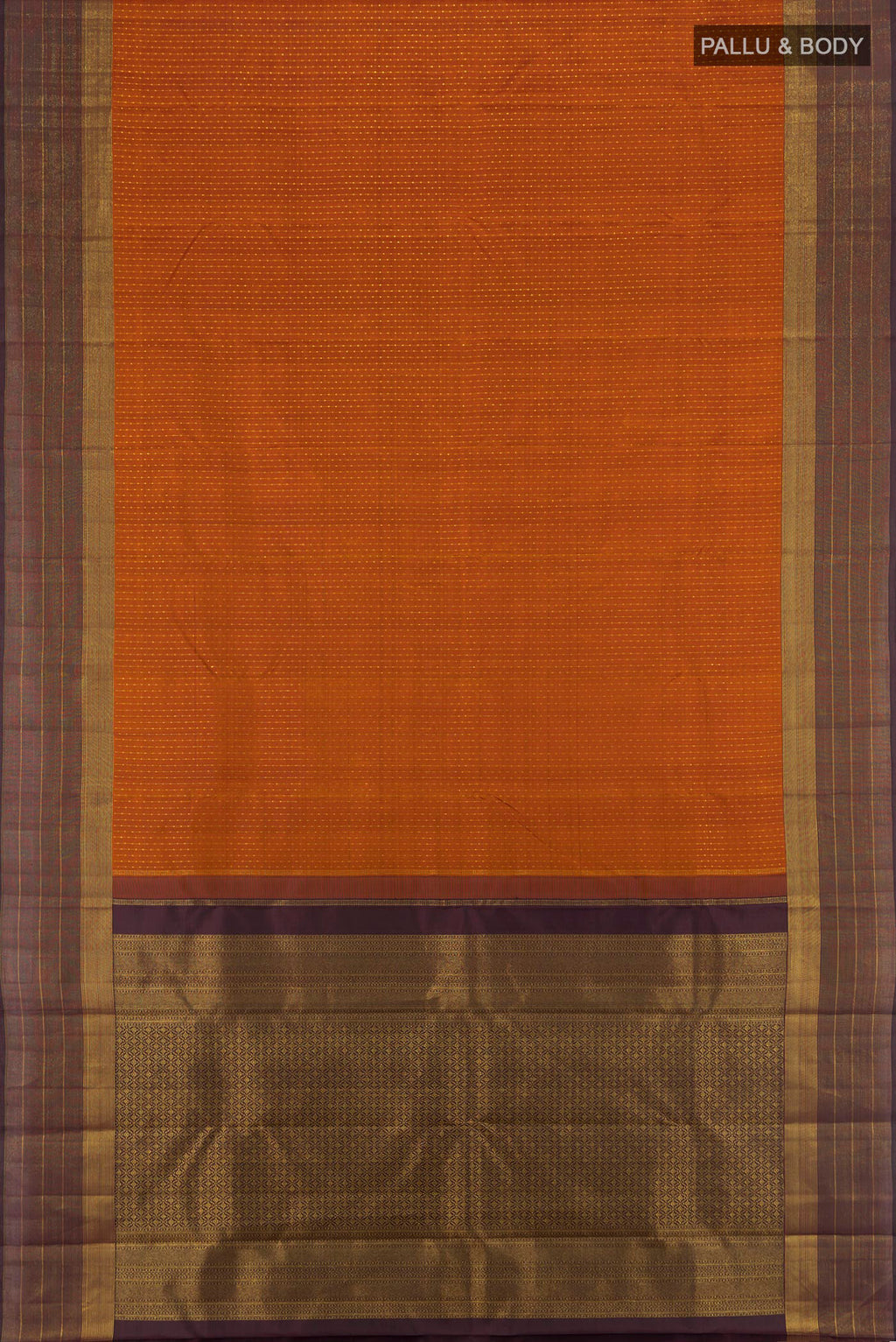 Flat view of Rust Kanjivaram Silk Saree with Zari Butta on the body and Plain Border. 