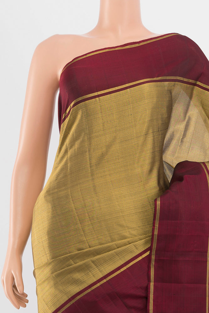 Border image of Golden Kanjivaram Silk Saree with Zari Butta on the body and Silk Border. 