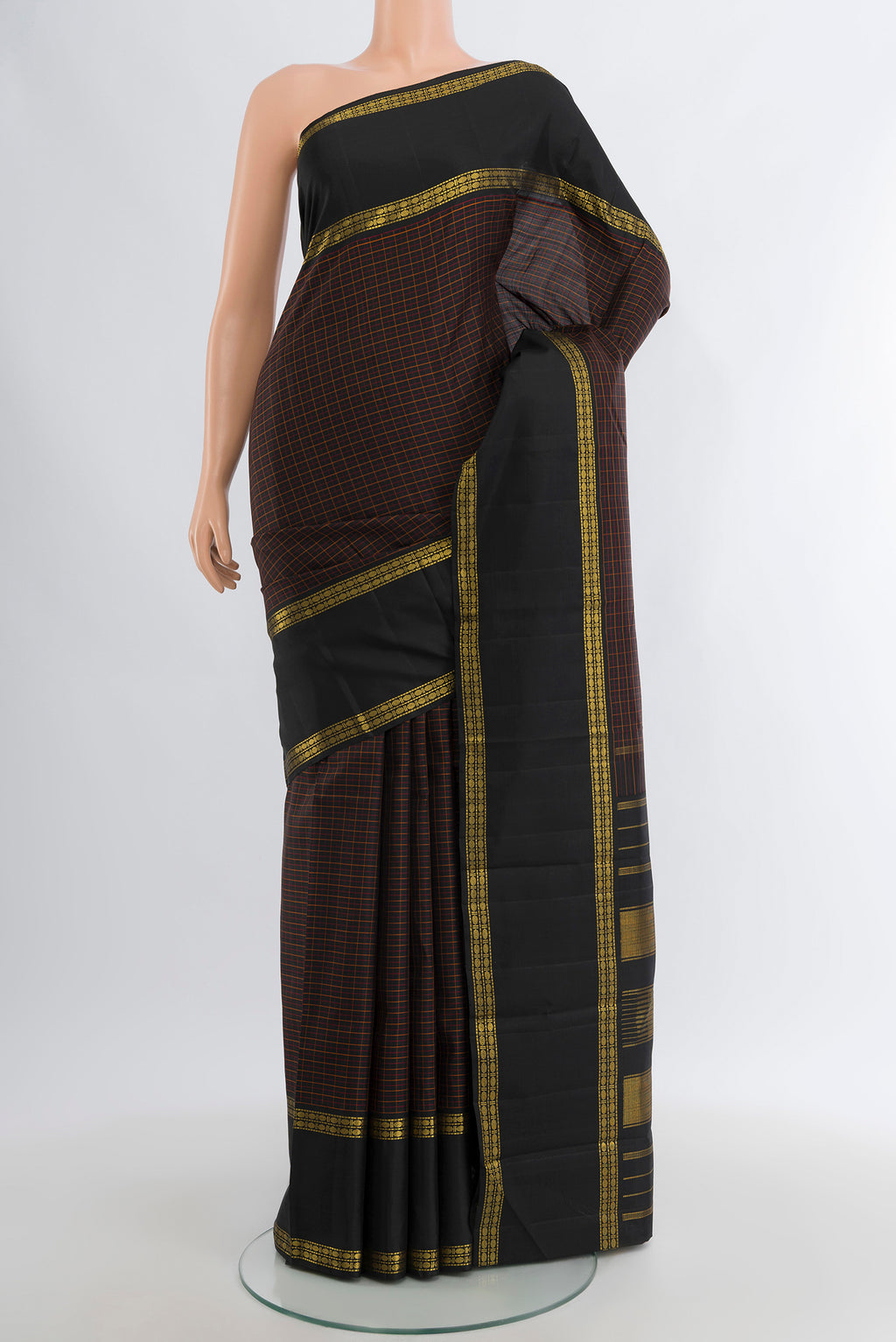 Black Kanjivaram Silk Saree with Checked design on the body and Zari Border.  displayed on a mannequin