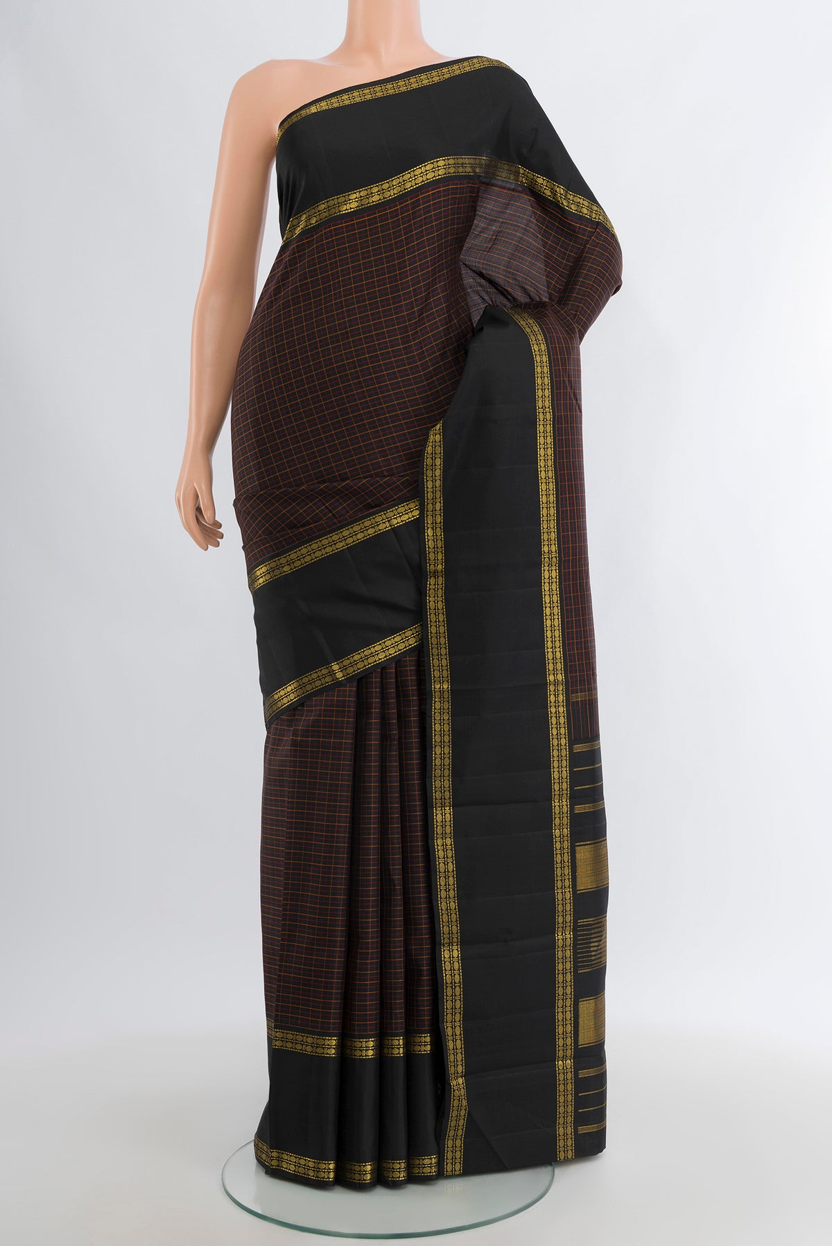 Black Kanjivaram Silk Saree with Checked design on the body and Zari Border.  displayed on a mannequin