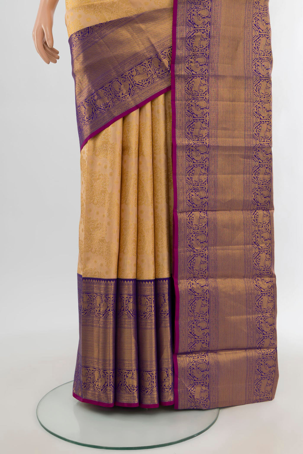 Pleats and pallu of Sandal Kanjivaram Silk Saree with Zari Brocade on the body and Zari Border. 