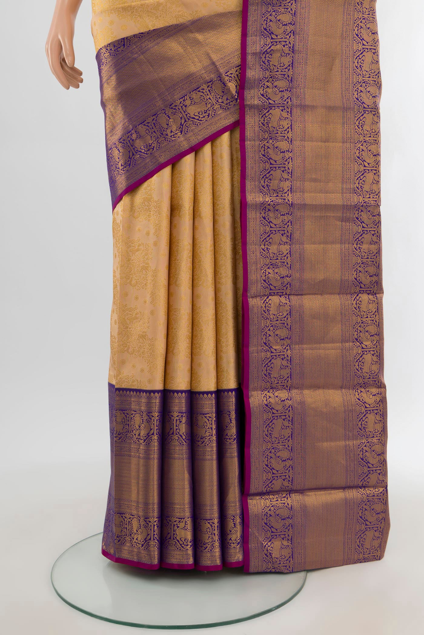 Pleats and pallu of Sandal Kanjivaram Silk Saree with Zari Brocade on the body and Zari Border. 