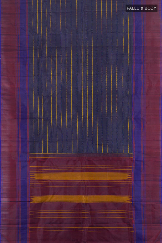 Flat view of Pure Silk Pure Zari Multi Color Kanchipuram Saree with Zari Butta on the body and Silk Border. 
