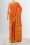 Orange Kanjivaram Silk Saree with Zari Butta on the body and Silk Border.  displayed on a mannequin