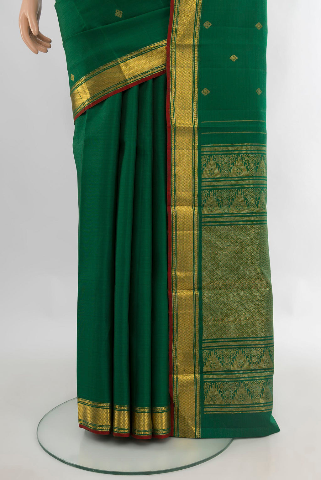 Pleats and pallu of Pure Silk Green Kanjivaram Saree with Zari Butta on the body and Zari Border. 