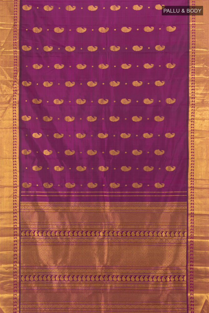 Flat view of Purple Kanjivaram Silk Saree with Zari Butta on the body and Silk Border. 