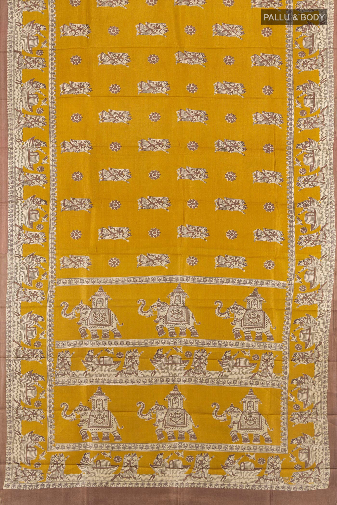 Flat view of Mustard Tussar Silk Saree with Printed design on the body and Printed Border. 