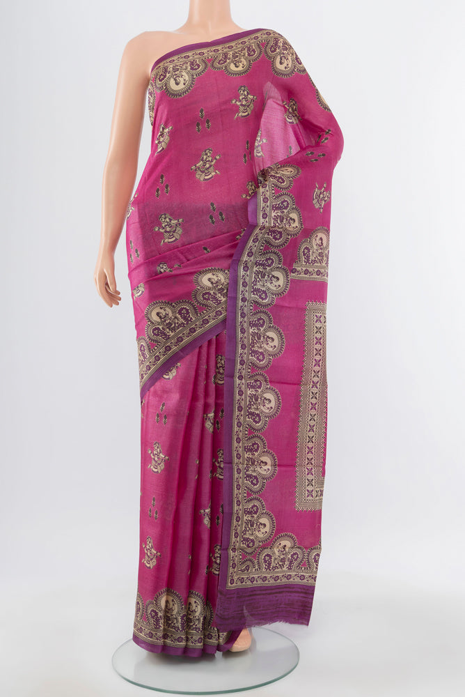 Pure Silk Pure Zari Light Magenta Tussar Saree with Floral Print on the body and Silk Border.  displayed on a mannequin