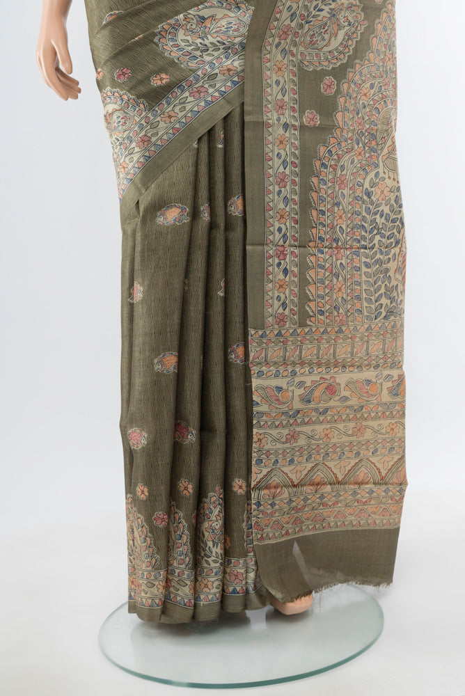 Pleats and pallu of Light Green Tussar Silk Saree with Floral Print on the body and Silk Border. 