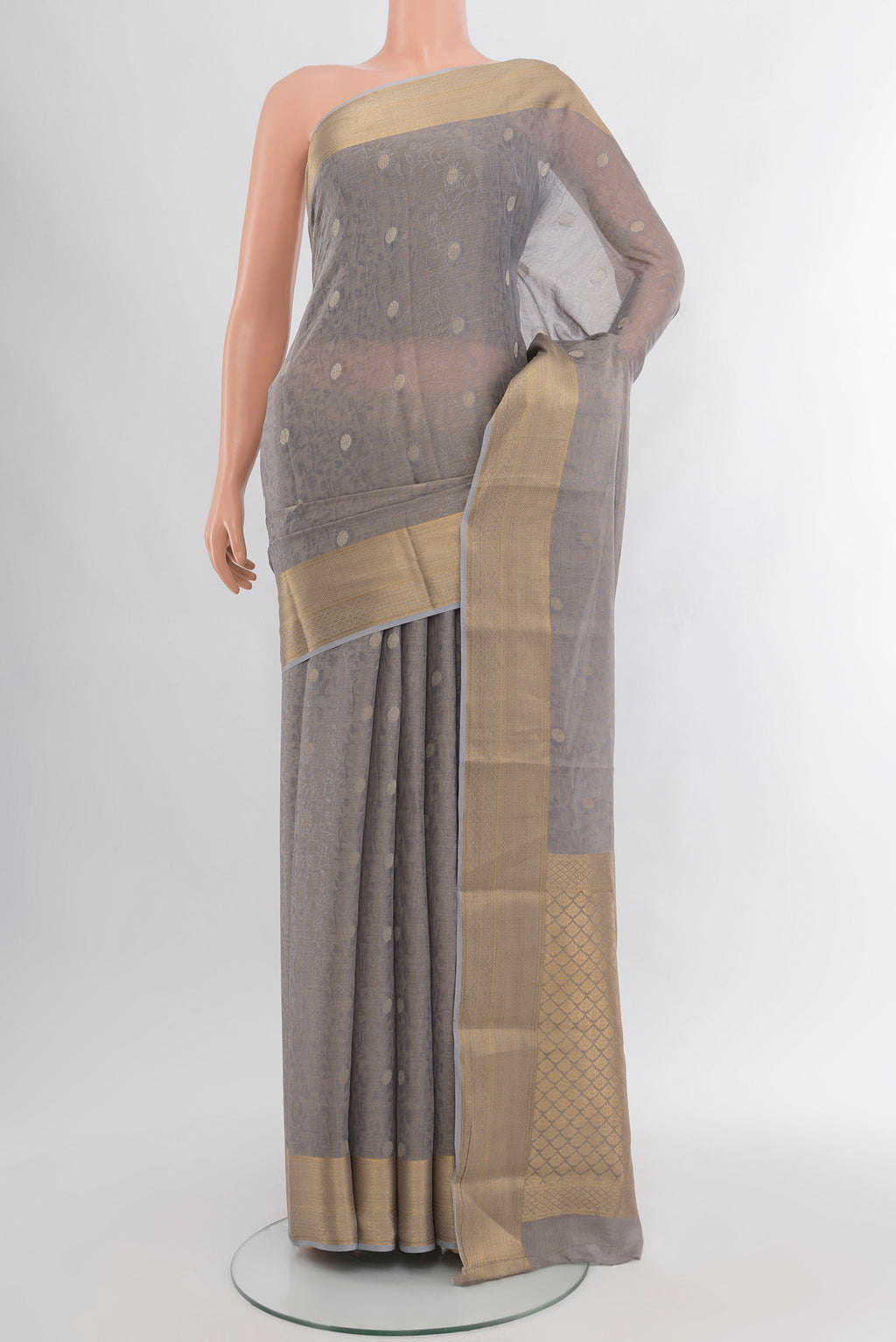Davys Grey Mysore Georgette Saree with Zari Butta on the body and Zari Border.  displayed on a mannequin