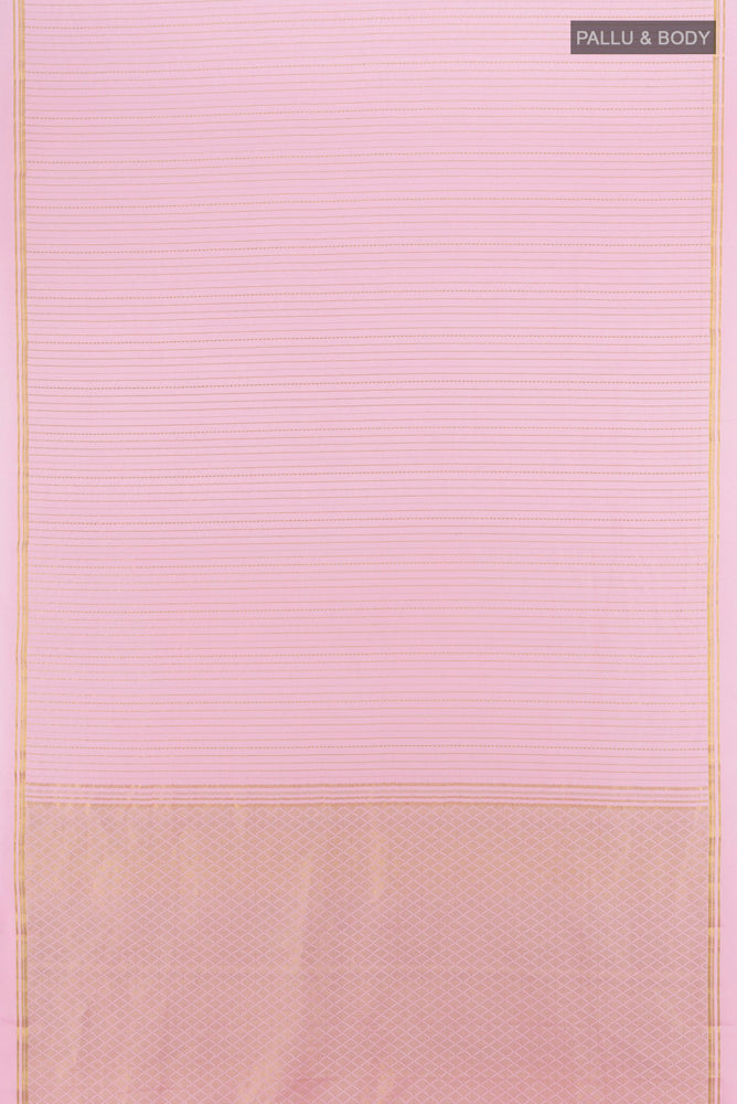 Flat view of Rose Gold Mysore Crepe Saree with Zari Butta on the body and Silk Border. 