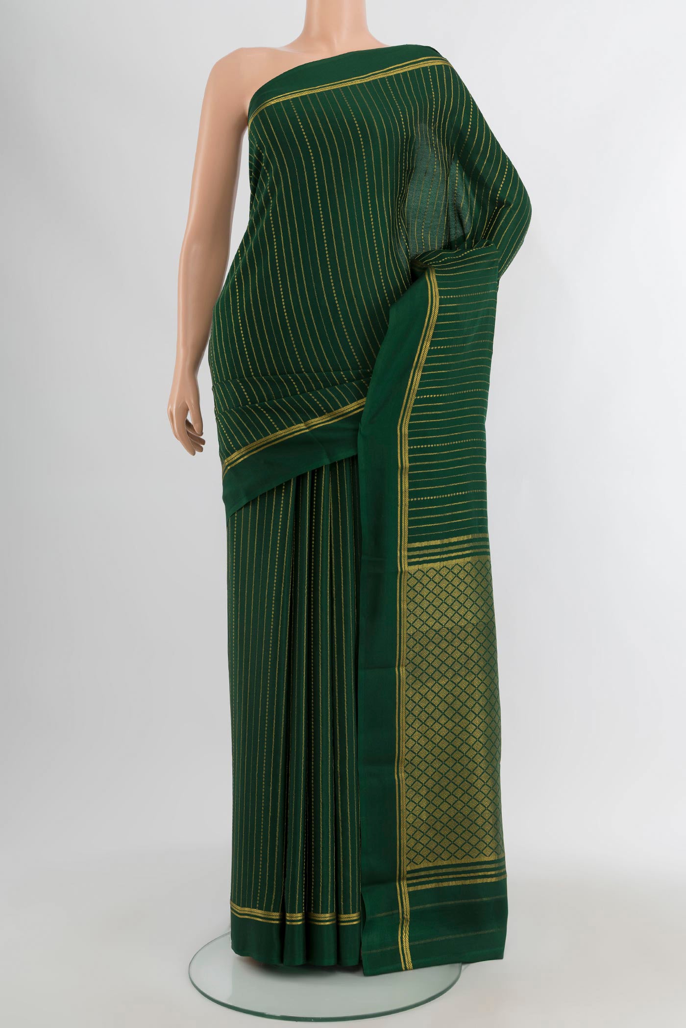 Bottle Green Mysore Crepe Saree with Stripes on the body and Plain Border.  displayed on a mannequin