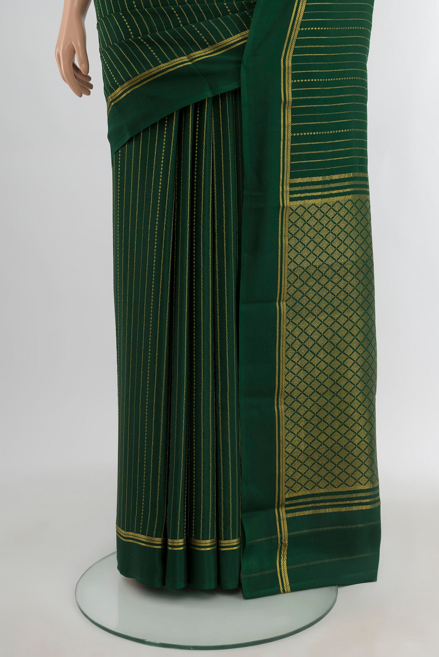 Pleats and pallu of Bottle Green Mysore Crepe Saree with Stripes on the body and Plain Border. 