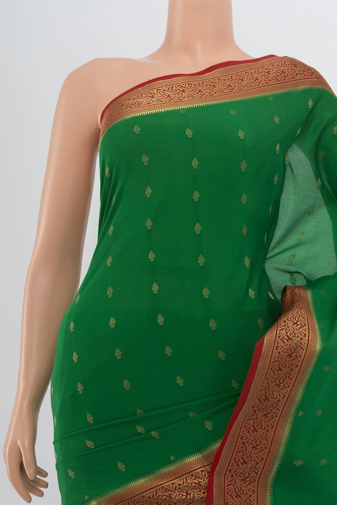 Border image of Mint Green Mysore Crepe Saree with Zari Butta on the body and Zari Border. 