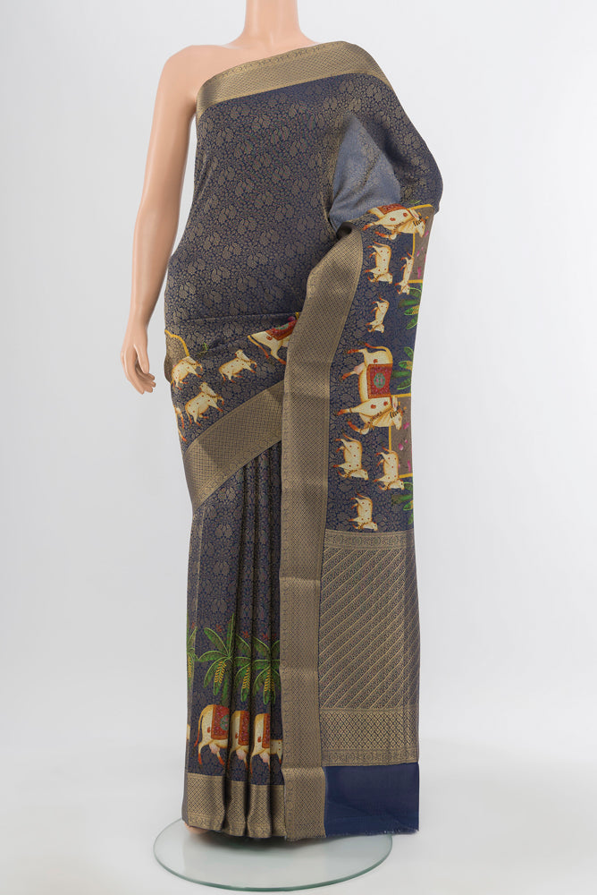 Navy Blue Mysore Georgette Saree with Zari Butta on the body and Silk Border.  displayed on a mannequin