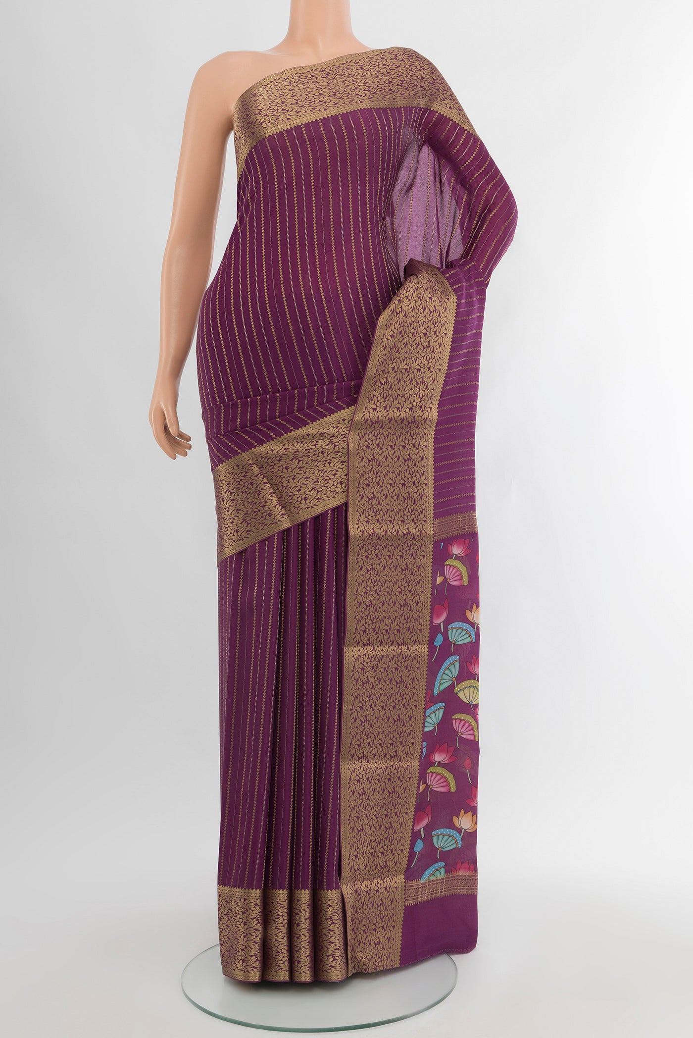 Purple Mysore Crepe Saree with Stripes on the body and Zari Border.  displayed on a mannequin