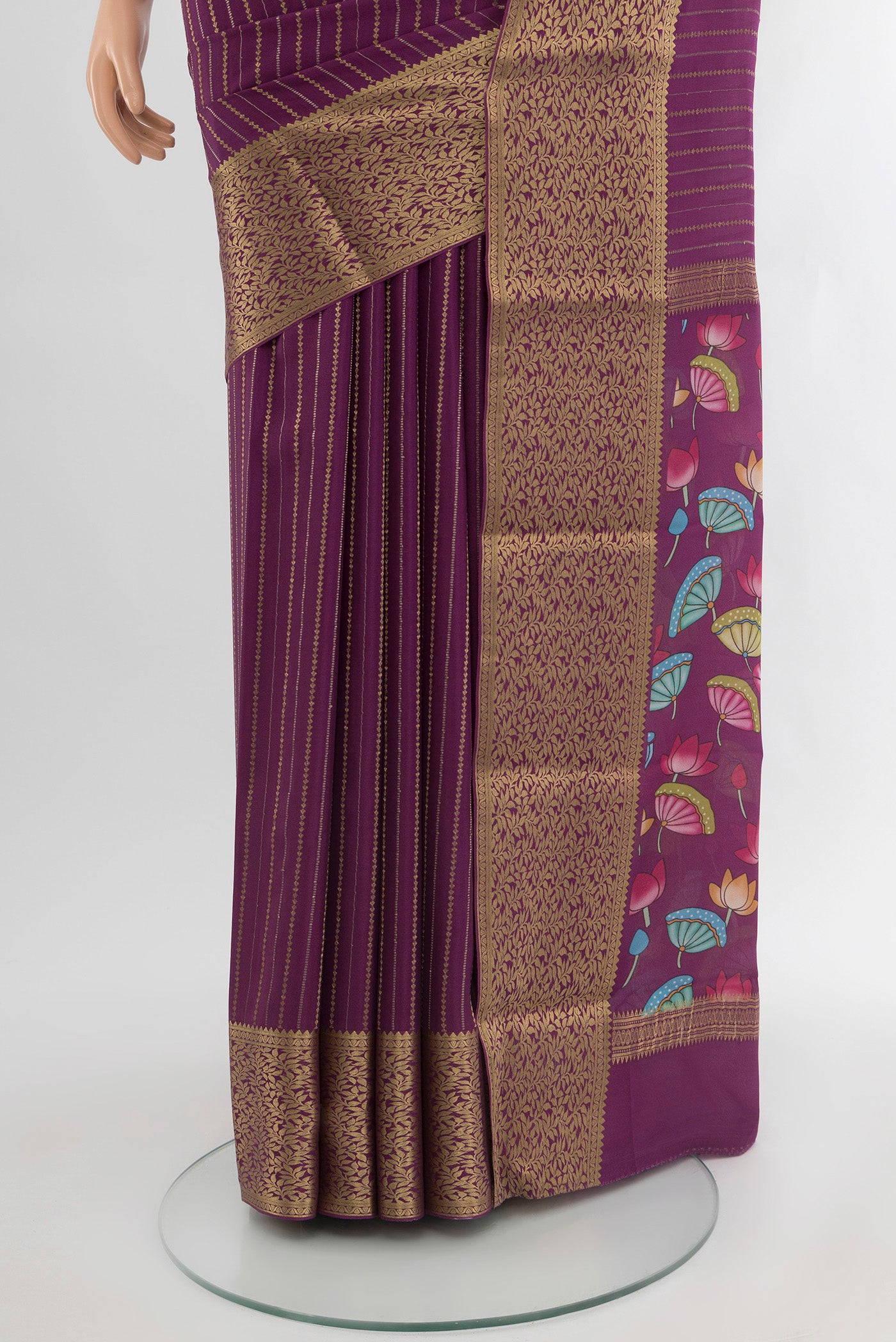 Pleats and pallu of Purple Mysore Crepe Saree with Stripes on the body and Zari Border. 
