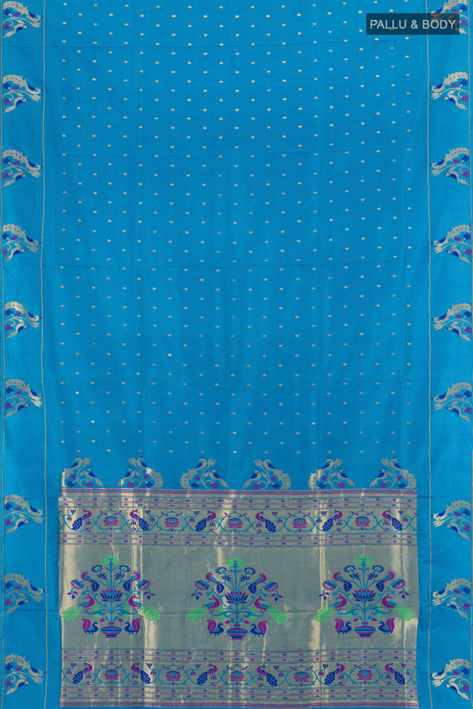 Flat view of Light Blue Soft Silk Saree with Zari Butta on the body and Silk Border. 