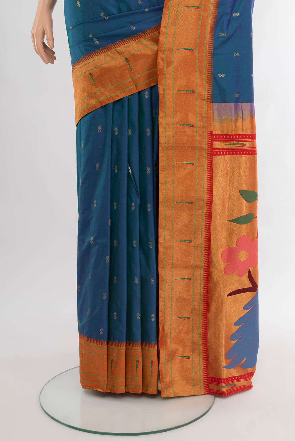 Pleats and pallu of Peacock Blue Paithani Silk Saree with Zari Butta on the body and Paithani Border. 
