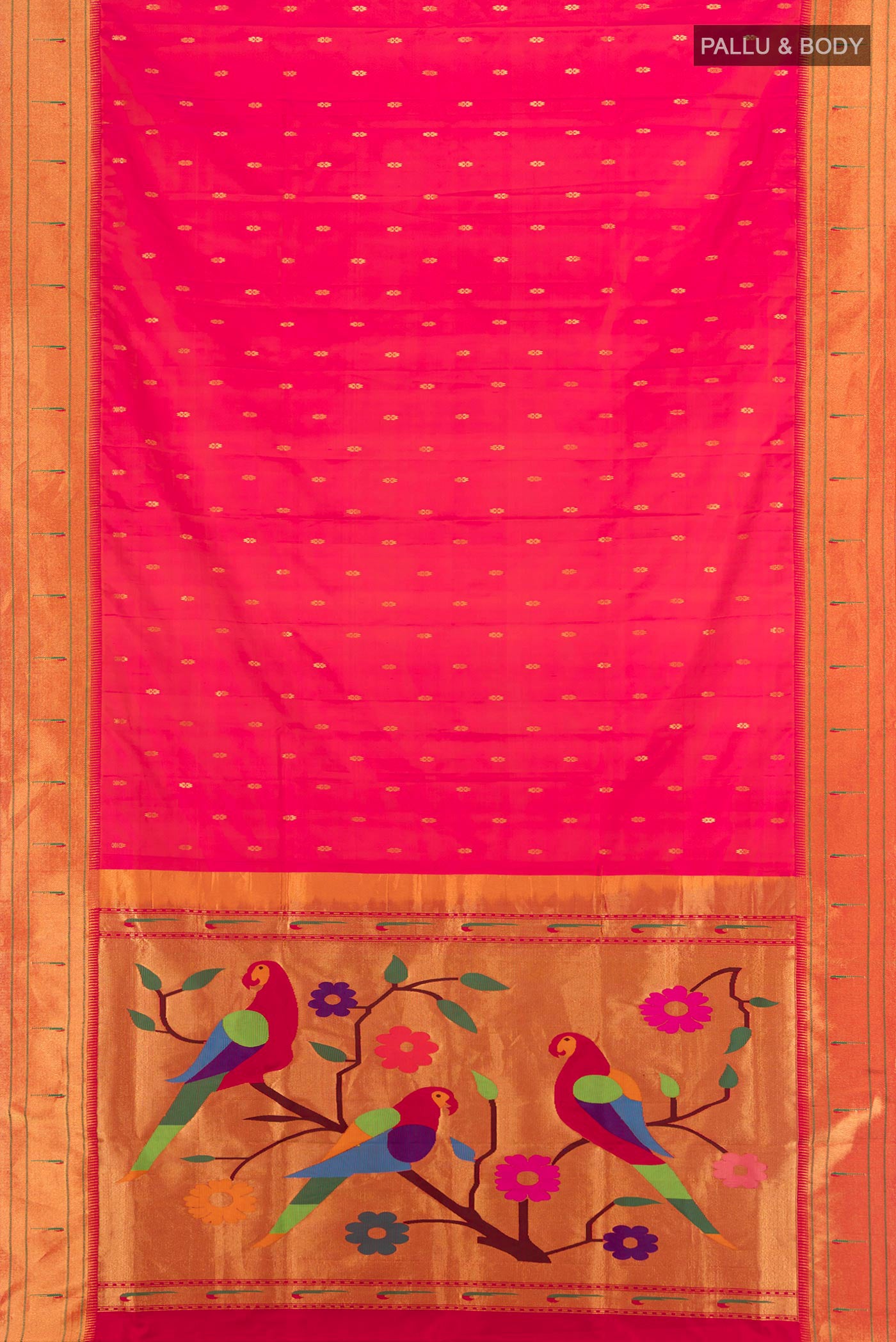 Flat view of Golden Peach Soft Silk Saree with Zari Butta on the body and Silk Border. 