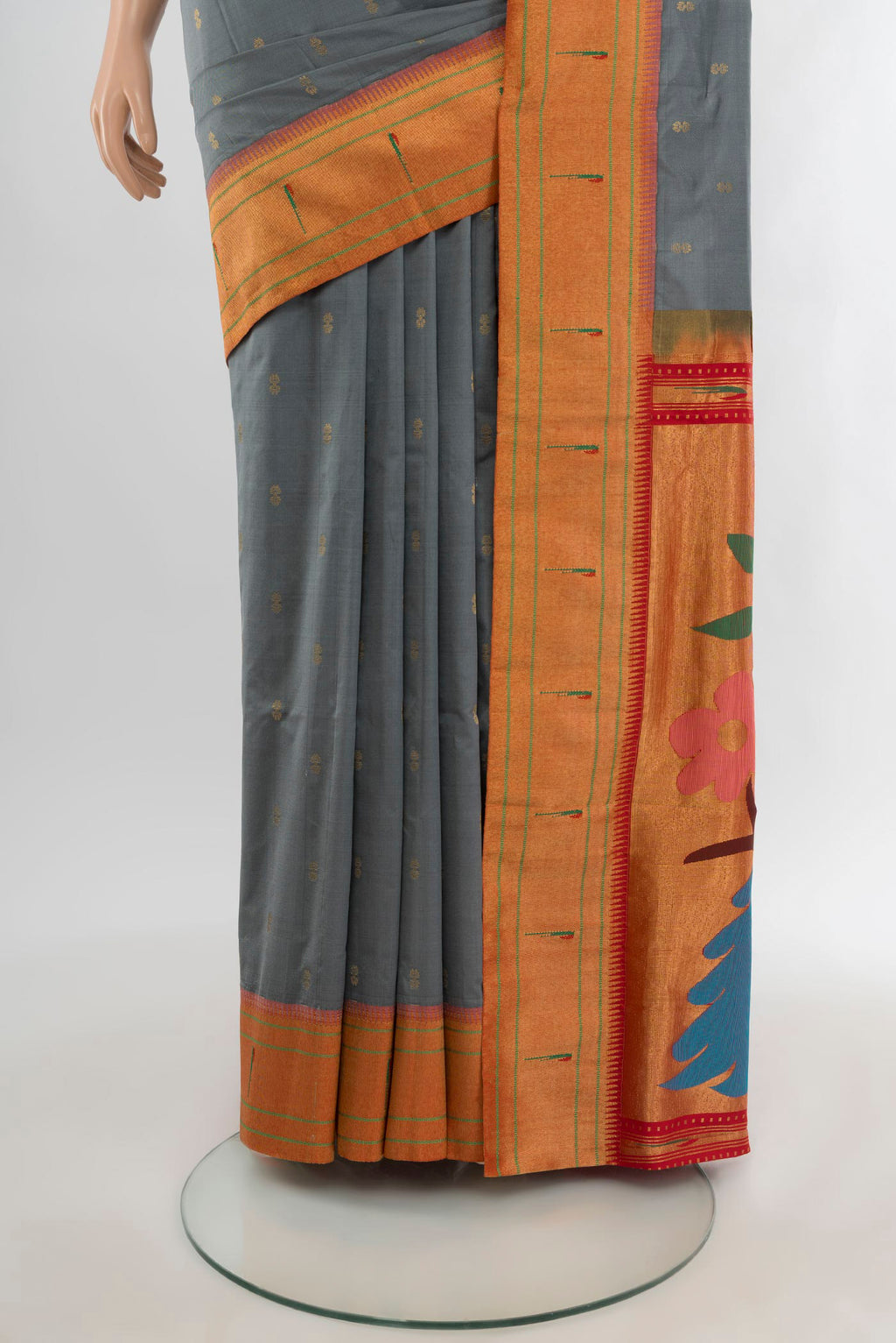 Pleats and pallu of Grey Paithani Silk Saree with Zari Butta on the body and Paithani Border. 