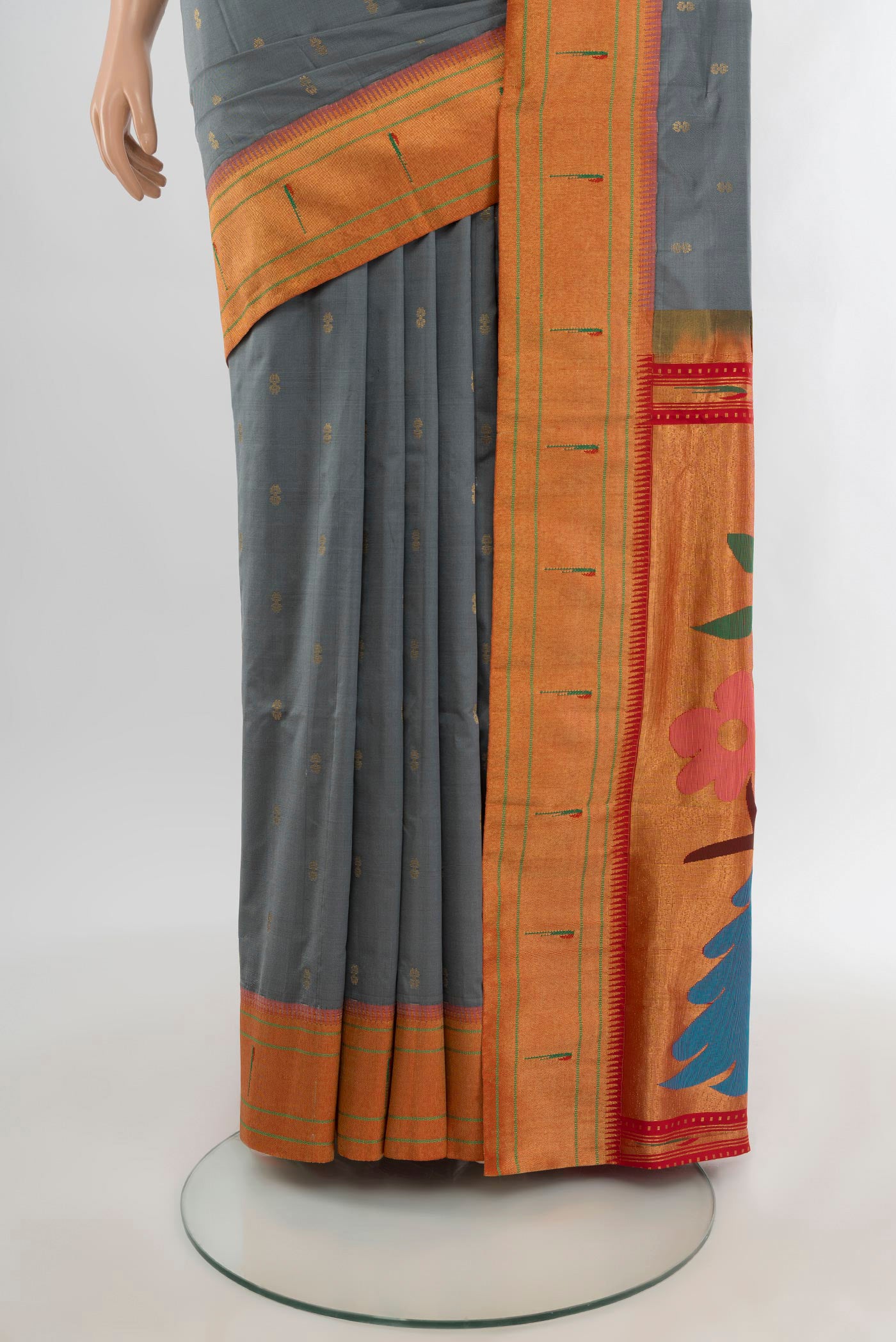 Pleats and pallu of Grey Paithani Silk Saree with Zari Butta on the body and Paithani Border. 