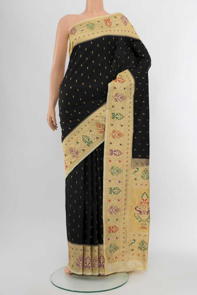 Black Paithani Silk Saree with Zari Butta on the body and Silk Border.  displayed on a mannequin