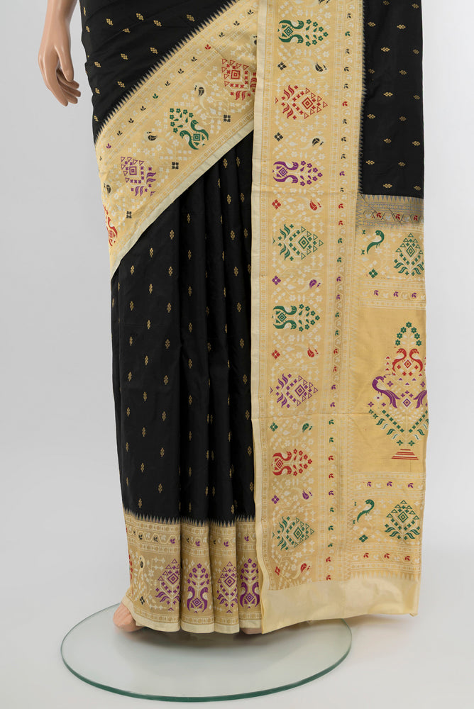 Pleats and pallu of Black Paithani Silk Saree with Zari Butta on the body and Silk Border. 