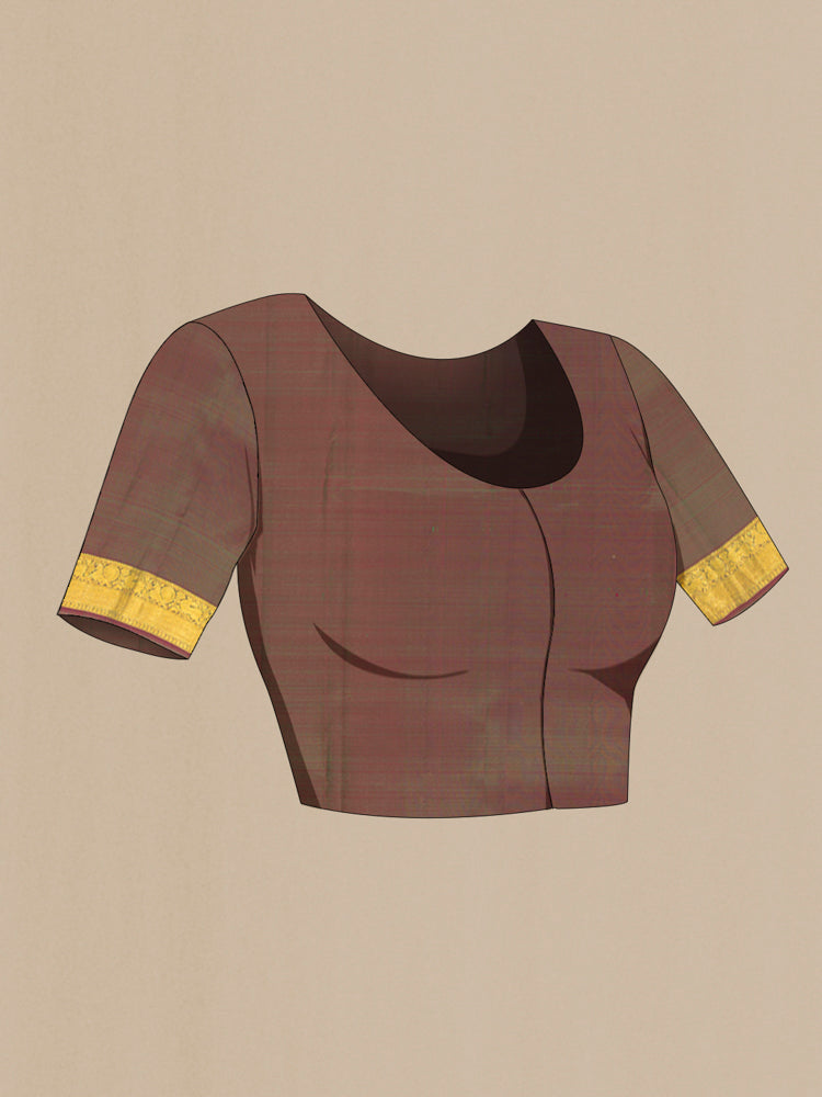 Close up image of the blouse of Pure Silk Pure Zari Green Kanjivaram Saree with Zari Butta on the body and Silk Border. 