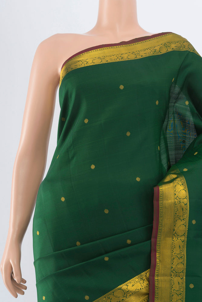 Border image of Pure Silk Pure Zari Green Kanjivaram Saree with Zari Butta on the body and Silk Border. 
