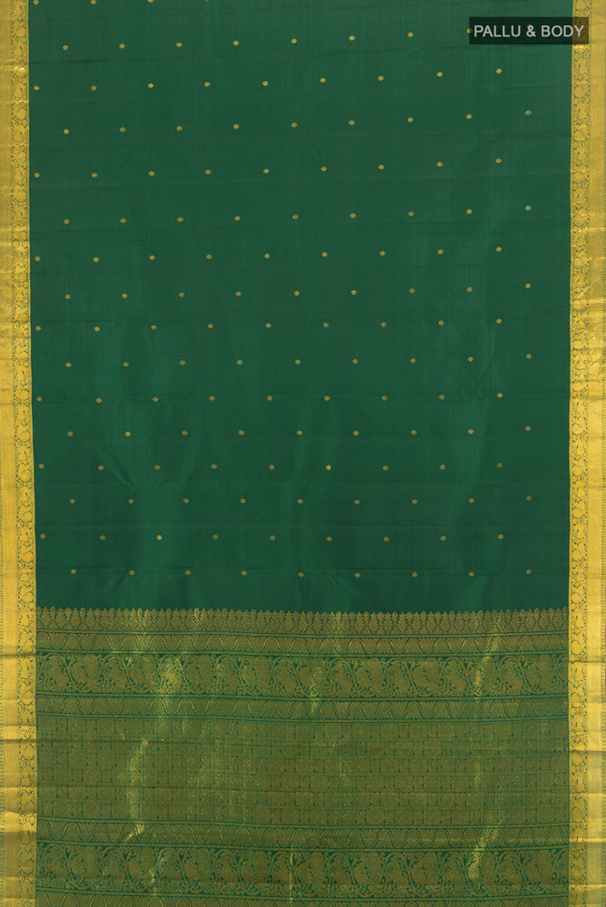 Flat view of Pure Silk Pure Zari Green Kanjivaram Saree with Zari Butta on the body and Silk Border. 