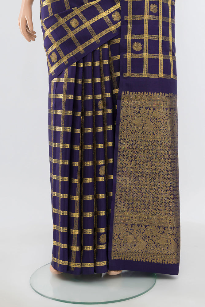 Pleats and pallu of Pure Silk Pure Zari Navy Blue Kanjivaram Saree with Zari Brocade on the body and Silk Border. 