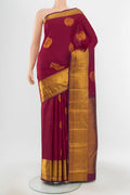Pure Silk Pure Zari Maroon Kanjivaram Saree with Zari Butta on the body and Silk Border.  displayed on a mannequin