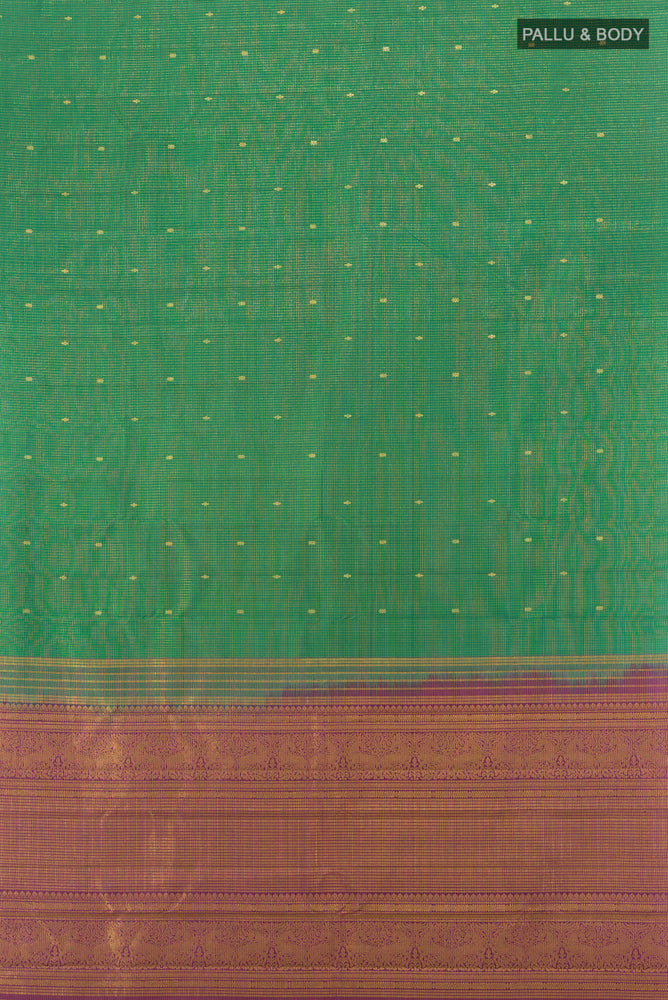 Flat view of Pure Silk Pure Zari Bottle Green Kanjivaram Saree with Zari Butta on the body and Silk Border. 