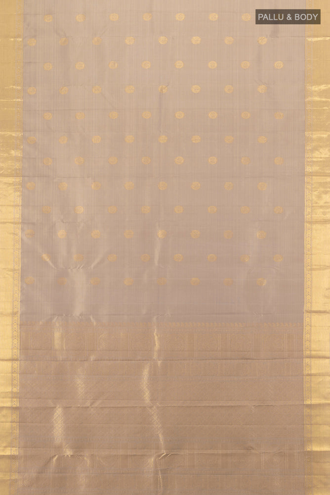 Flat view of Dark Beige Kanjivaram Silk Saree with Zari Butta on the body and Silk Border. 