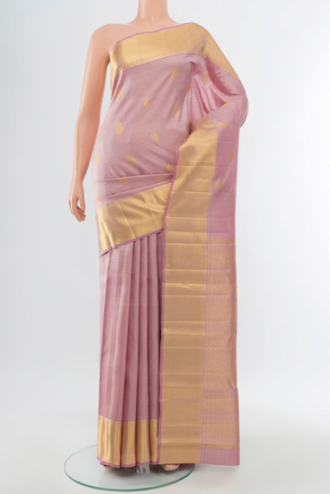 Rose pink Kanjivaram Silk Saree with Zari Butta on the body and Silk Border.  displayed on a mannequin
