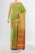 Pure Silk Pure Zari Pista Green Kanjivaram Saree with Zari Butta on the body and Silk Border.  displayed on a mannequin
