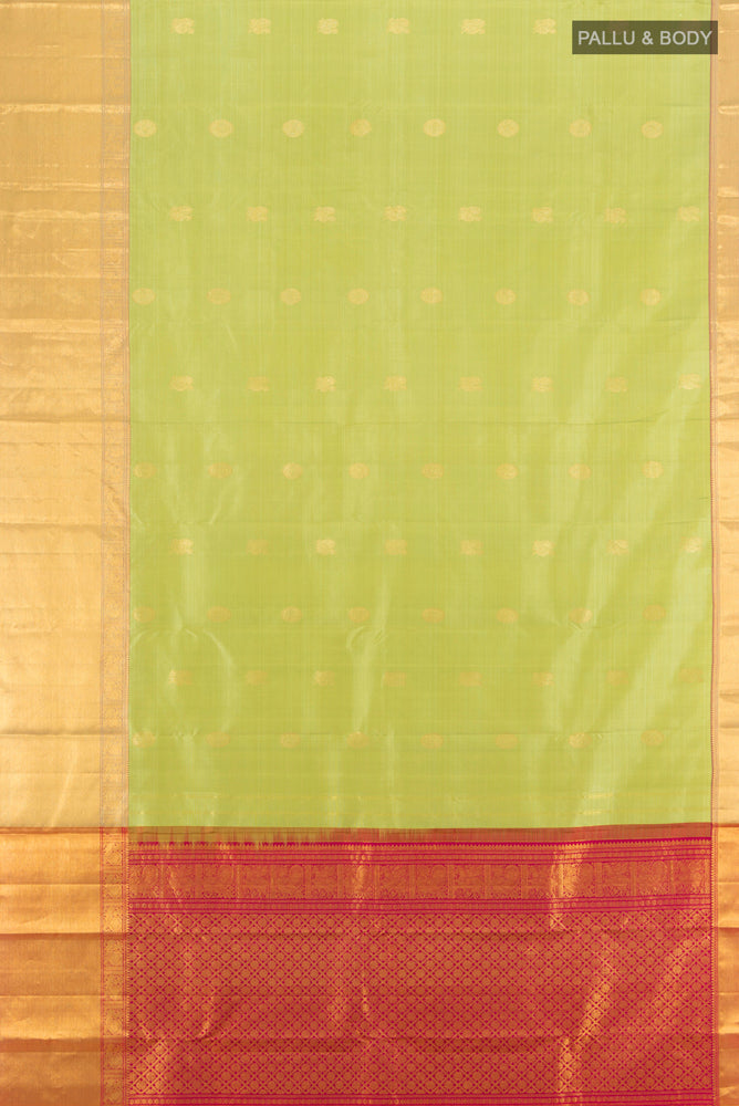 Flat view of Pure Silk Pure Zari Pista Green Kanjivaram Saree with Zari Butta on the body and Silk Border. 