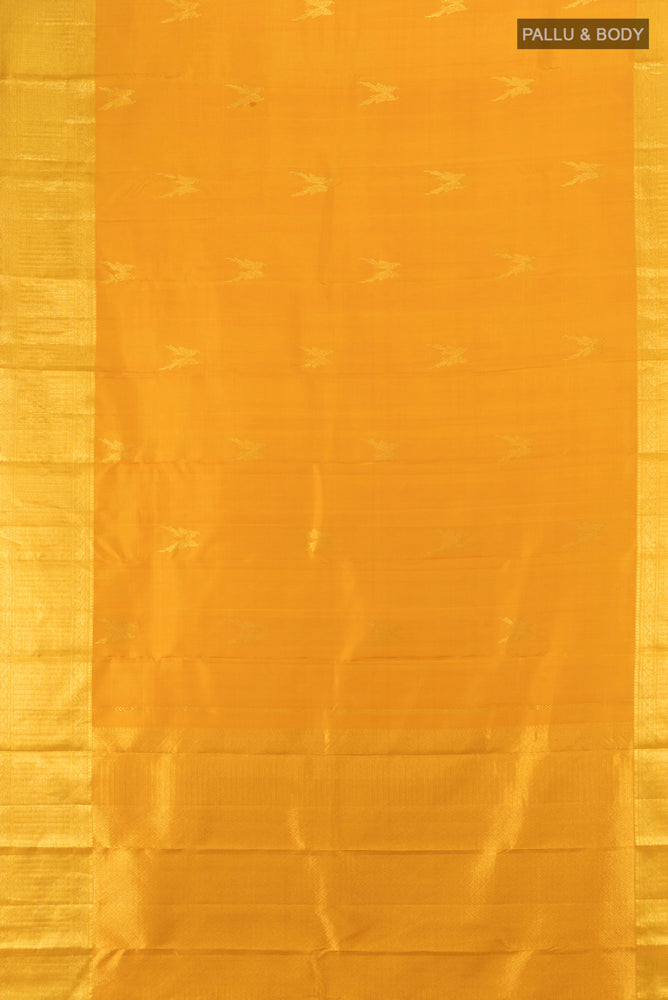 Flat view of Pure Silk Pure Zari Mustard Kanjivaram Saree with Zari Butta on the body and Silk Border. 
