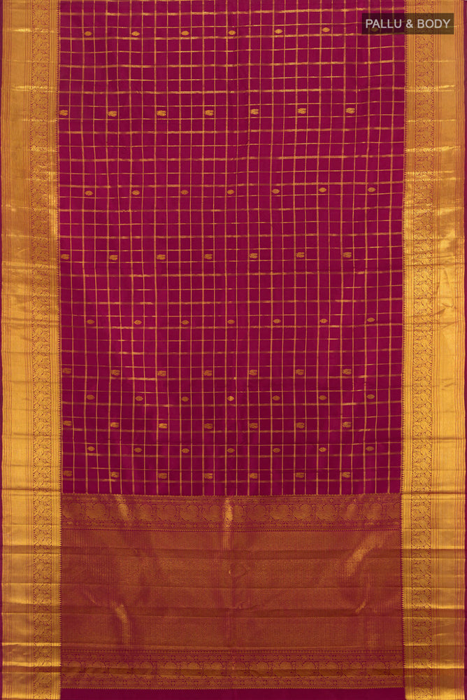 Flat view of Pure Silk Pure Zari Maroon Kanjivaram Saree with Zari Butta on the body and Silk Border. 