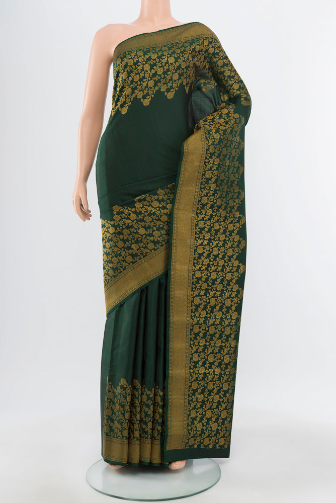 Pure Silk Pure Zari Mint Green Kanchipuram Saree with Zari Brocade on the body and Silk Border.  displayed on a mannequin