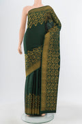 Pure Silk Pure Zari Mint Green Kanchipuram Saree with Zari Brocade on the body and Silk Border.  displayed on a mannequin