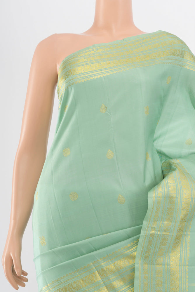 Border image of Pure Silk Pure Zari Pista Green Kanjivaram Saree with Zari Butta on the body and Silk Border. 