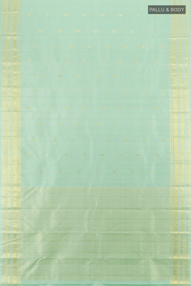 Flat view of Pure Silk Pure Zari Pista Green Kanjivaram Saree with Zari Butta on the body and Silk Border. 