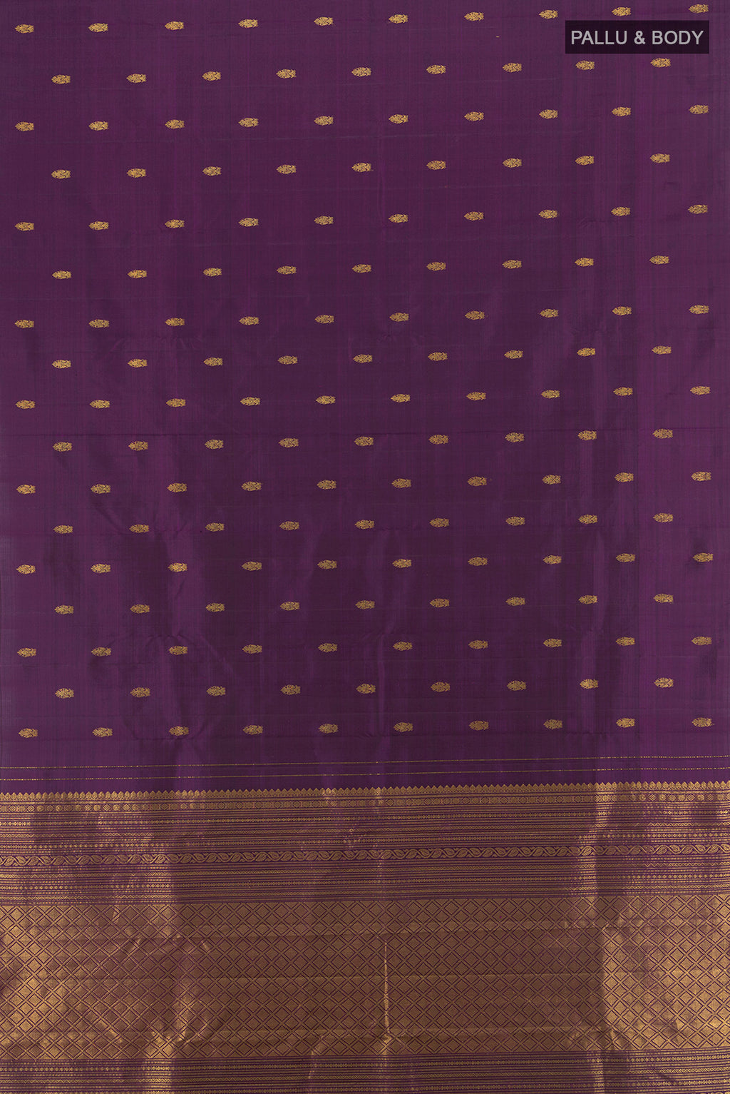 Flat view of Violet Kanchipuram Silk Saree with Zari Butta on the body and Zari Border. 
