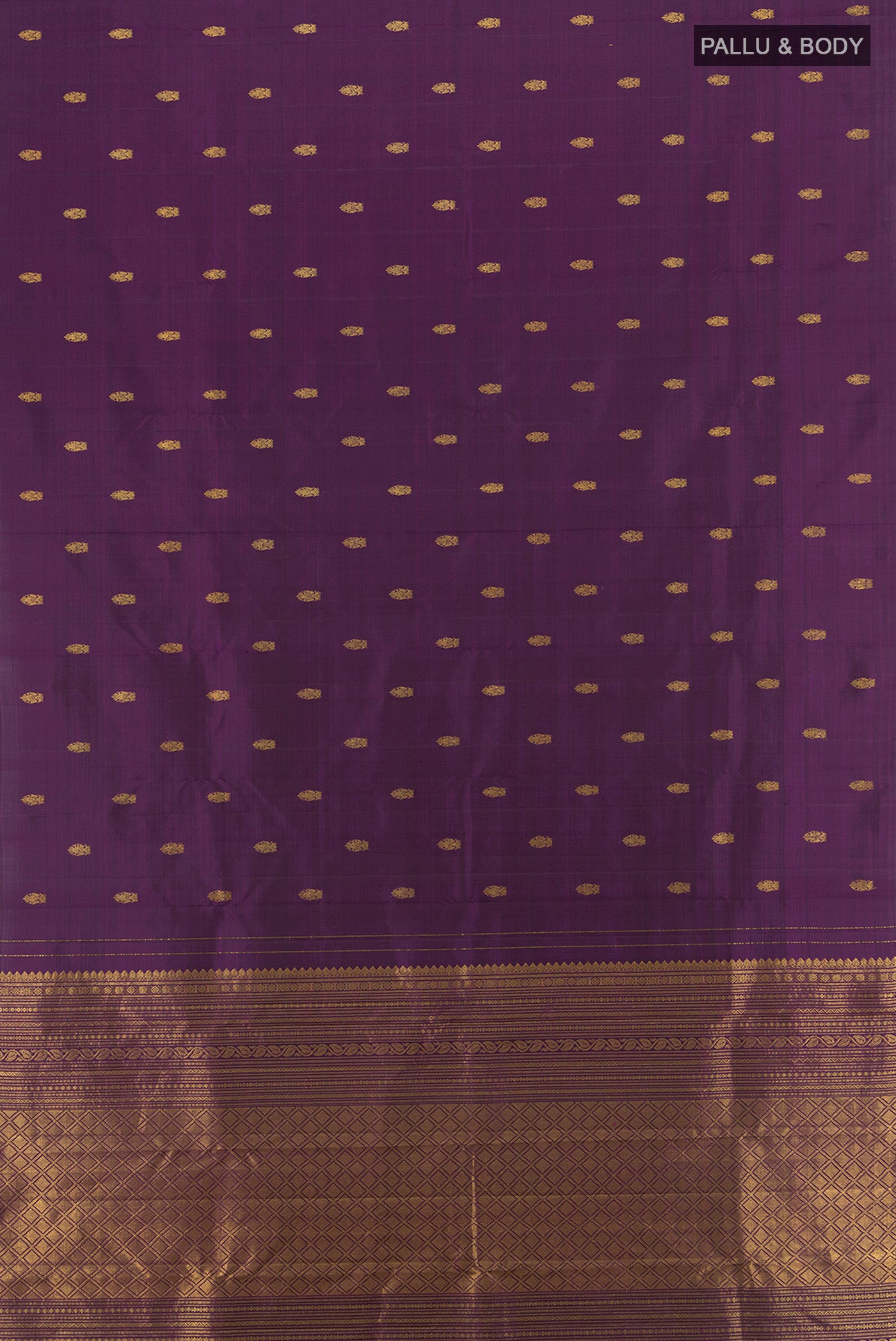 Flat view of Violet Kanchipuram Silk Saree with Zari Butta on the body and Zari Border. 