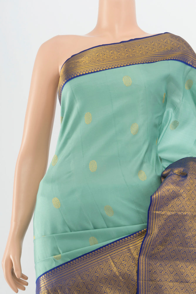 Border image of Pure Silk Pure Zari Teal Kanjivaram Saree with Zari Butta on the body and Silk Border. 